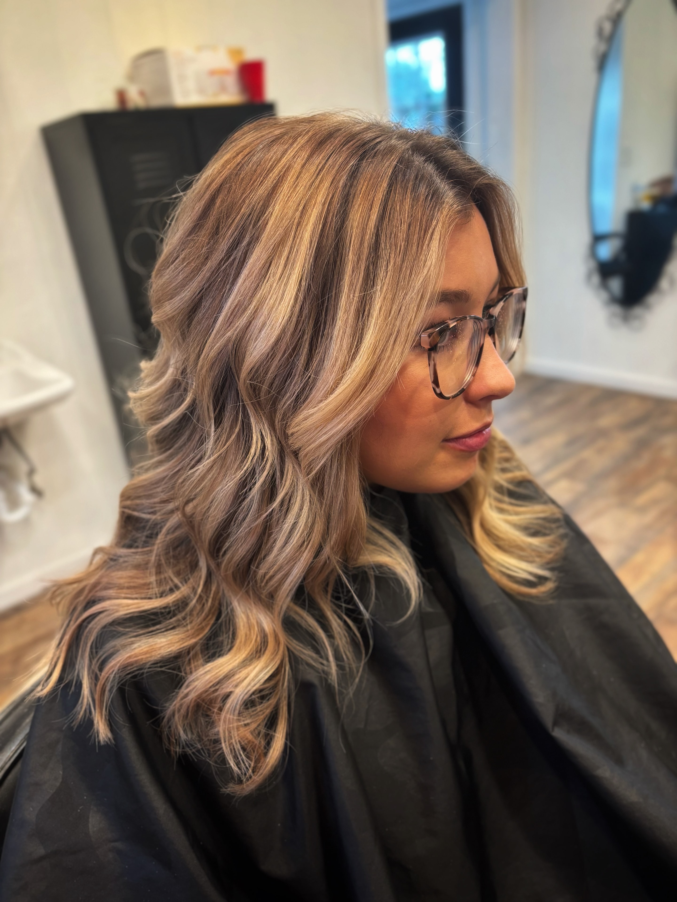 Blonde highlights and waves at Salon Misty