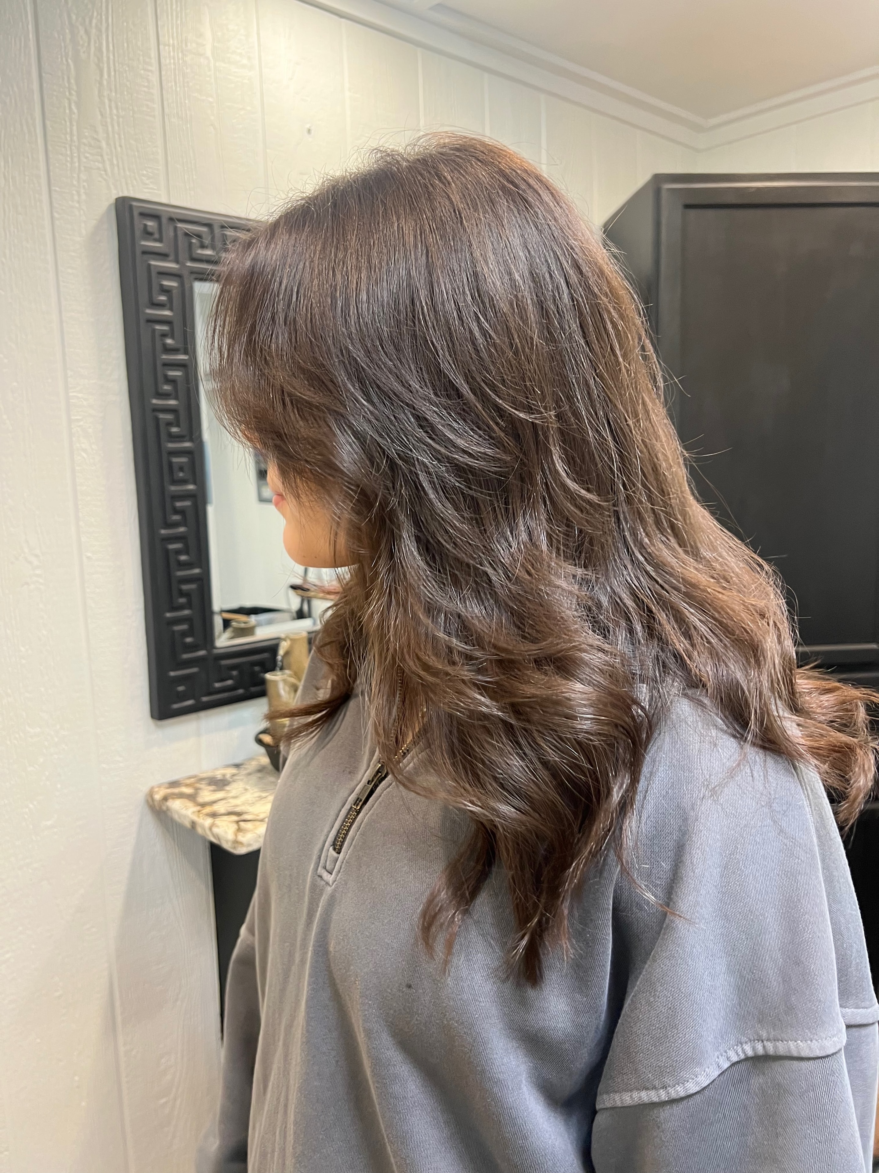 Brunette layers and waves at Salon Misty