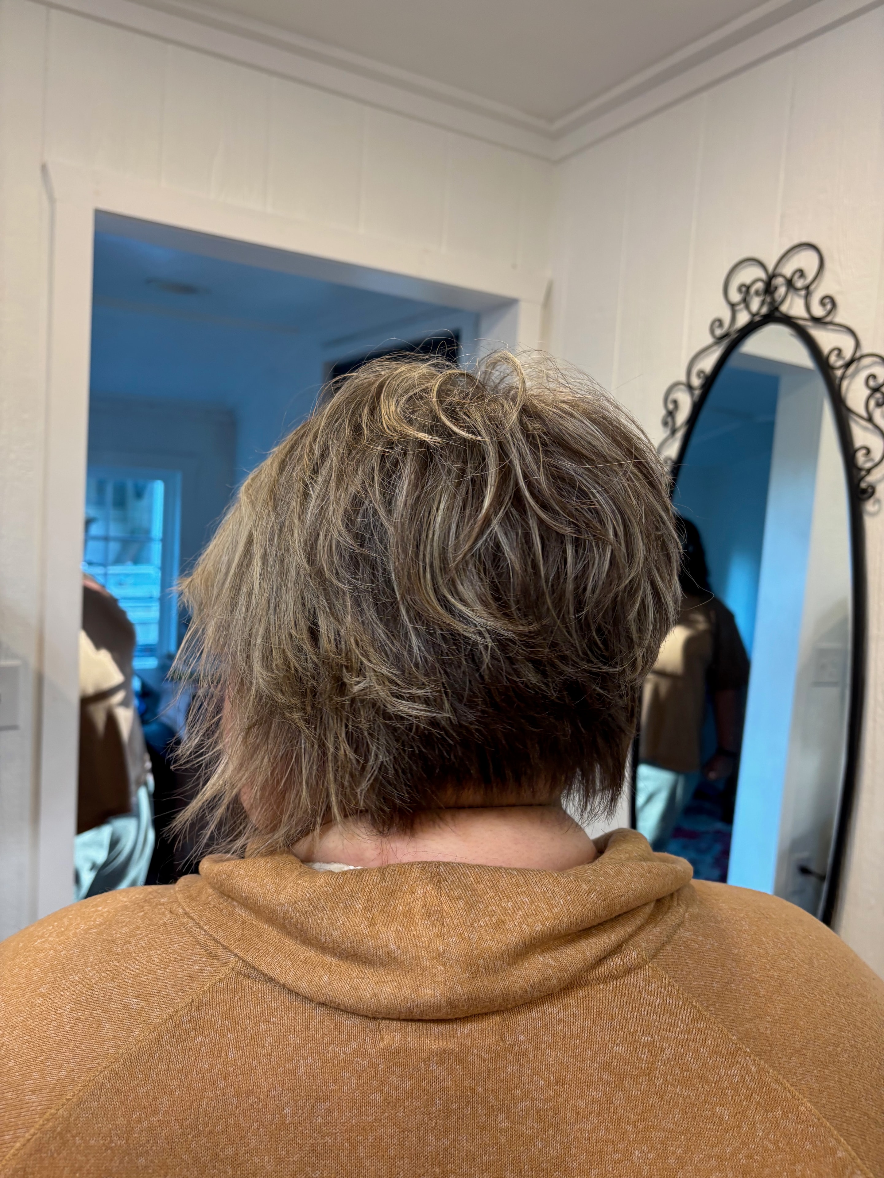 Textured bob with highlights at Salon Misty